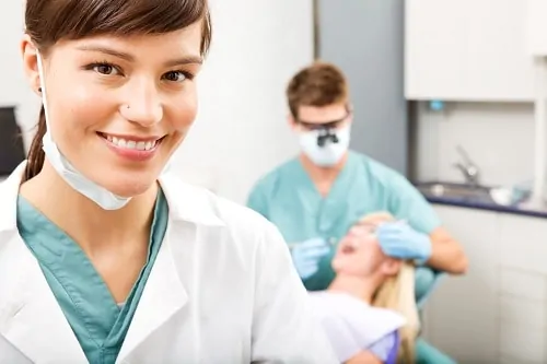 dental hygienist in foreground